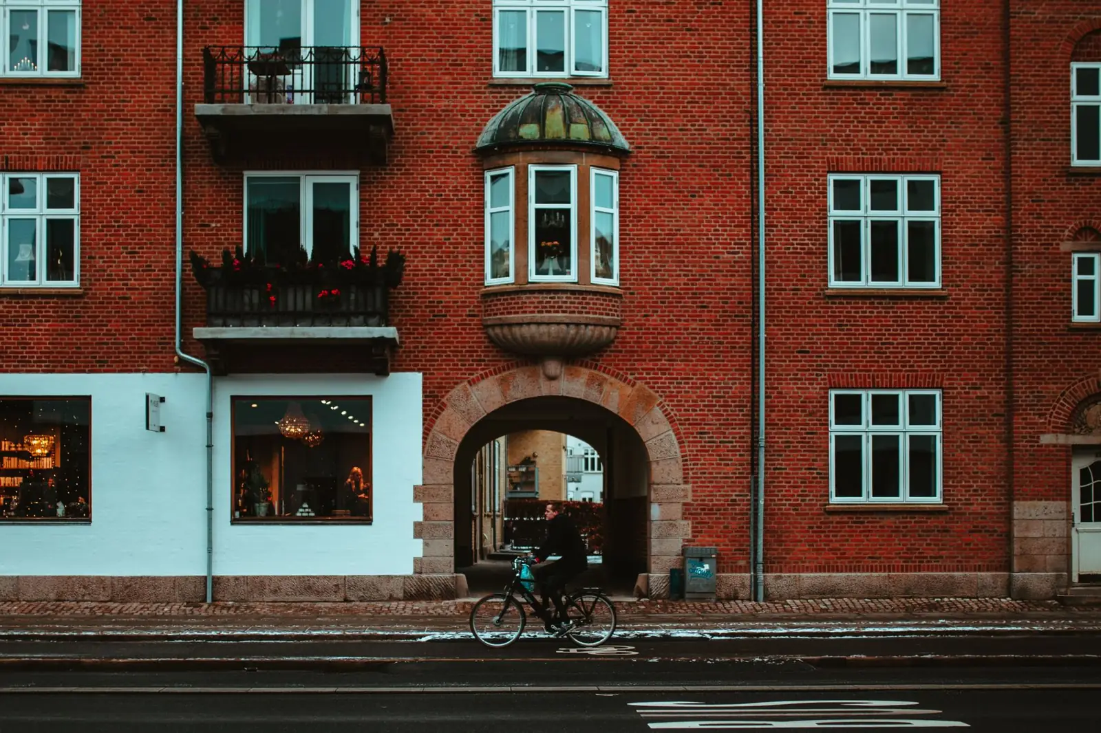 Historic brick façade along an Aalborg street