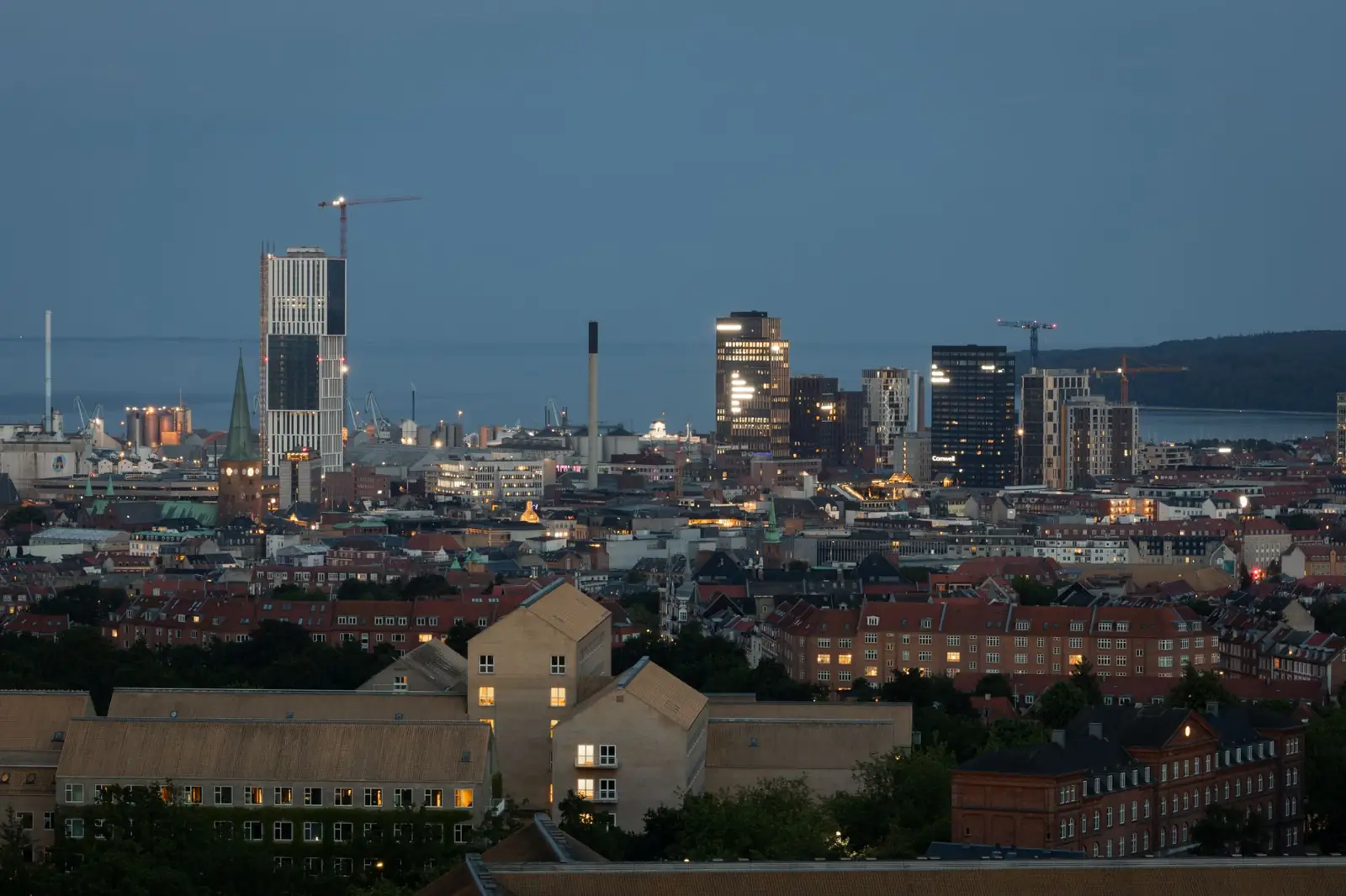 Aarhus Cathedral and the city skyline at twilight