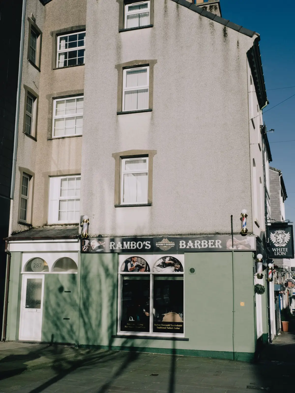 Historic street corner and shopfronts in Bangor, Wales