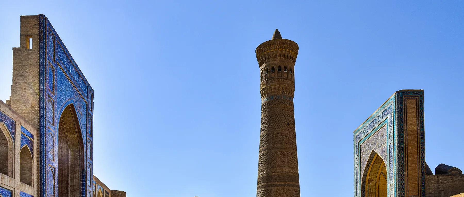 Kalon Minaret between the mosque and Miri Arab Madrasa in Bukhara