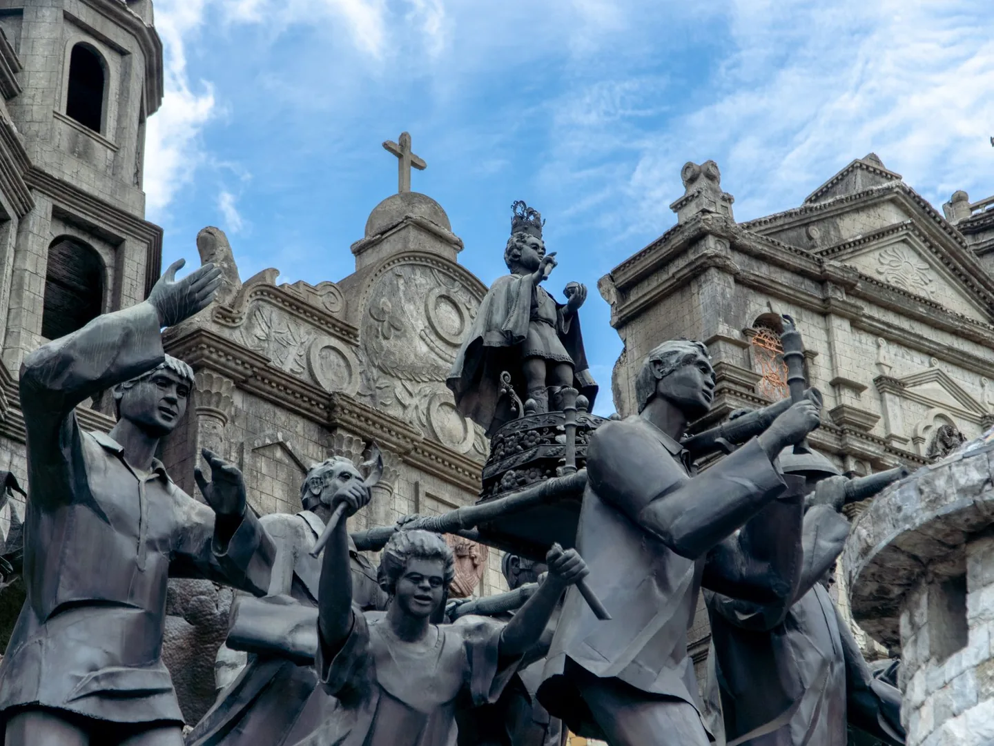 Figures, a model church façade and a galleon in the Heritage of Cebu Monument in Parian
