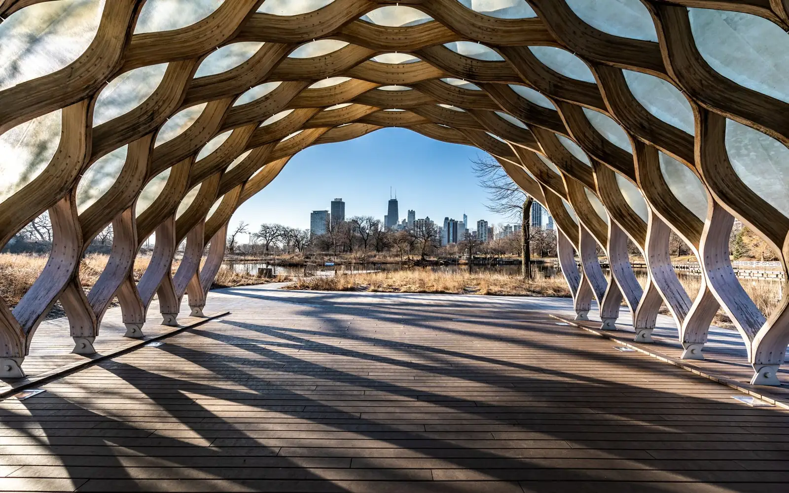 Peoples Gas Education Pavilion framing the Chicago skyline at Lincoln Park’s Nature Boardwalk
