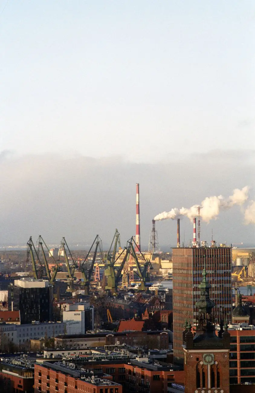 Shipyard cranes, industrial chimneys and the European Solidarity Centre’s rust-coloured building in Gdańsk