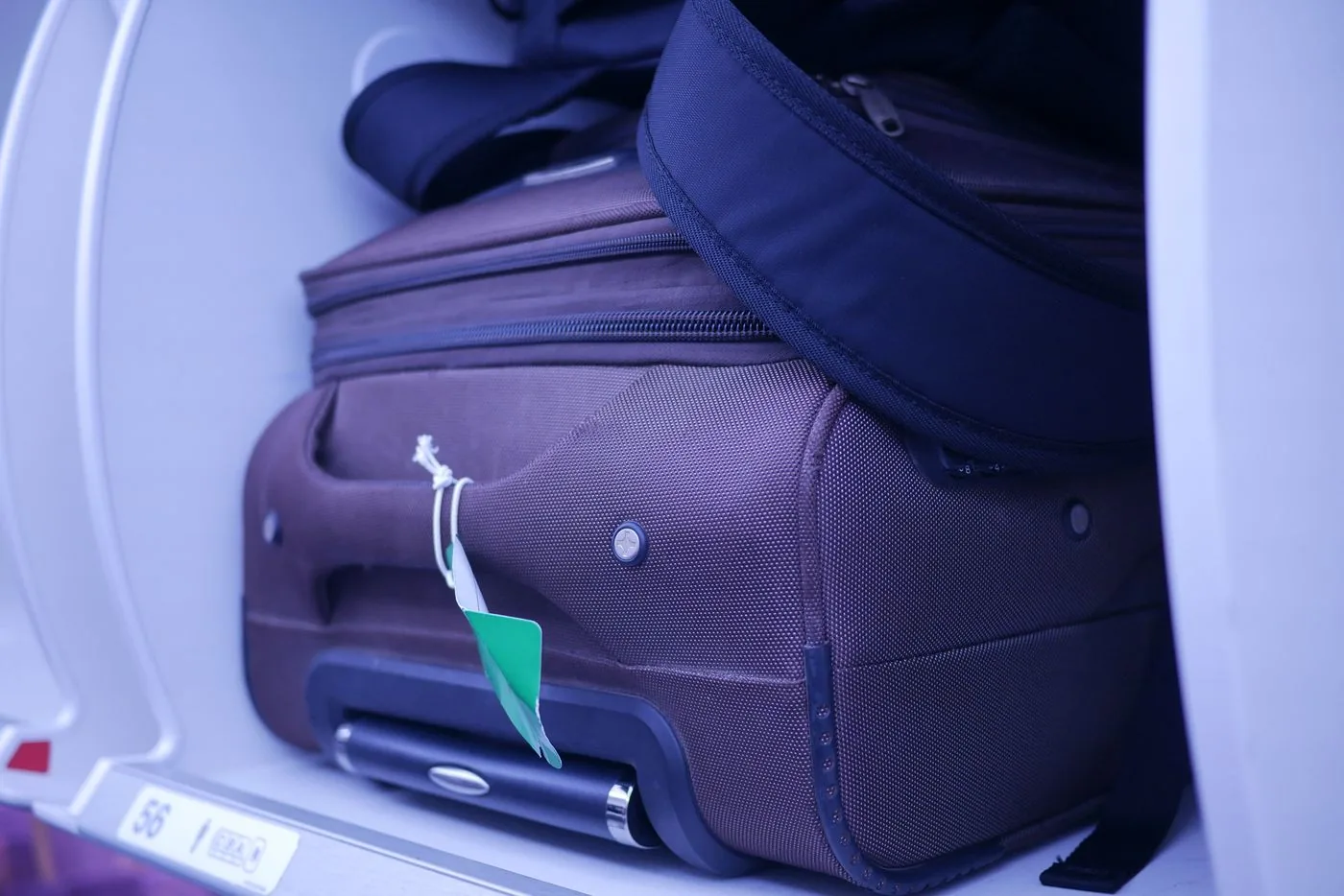 Cabin luggage stored in an aircraft overhead compartment