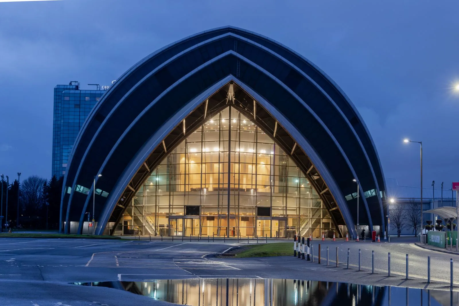 An illuminated event venue on Glasgow's Clyde waterfront