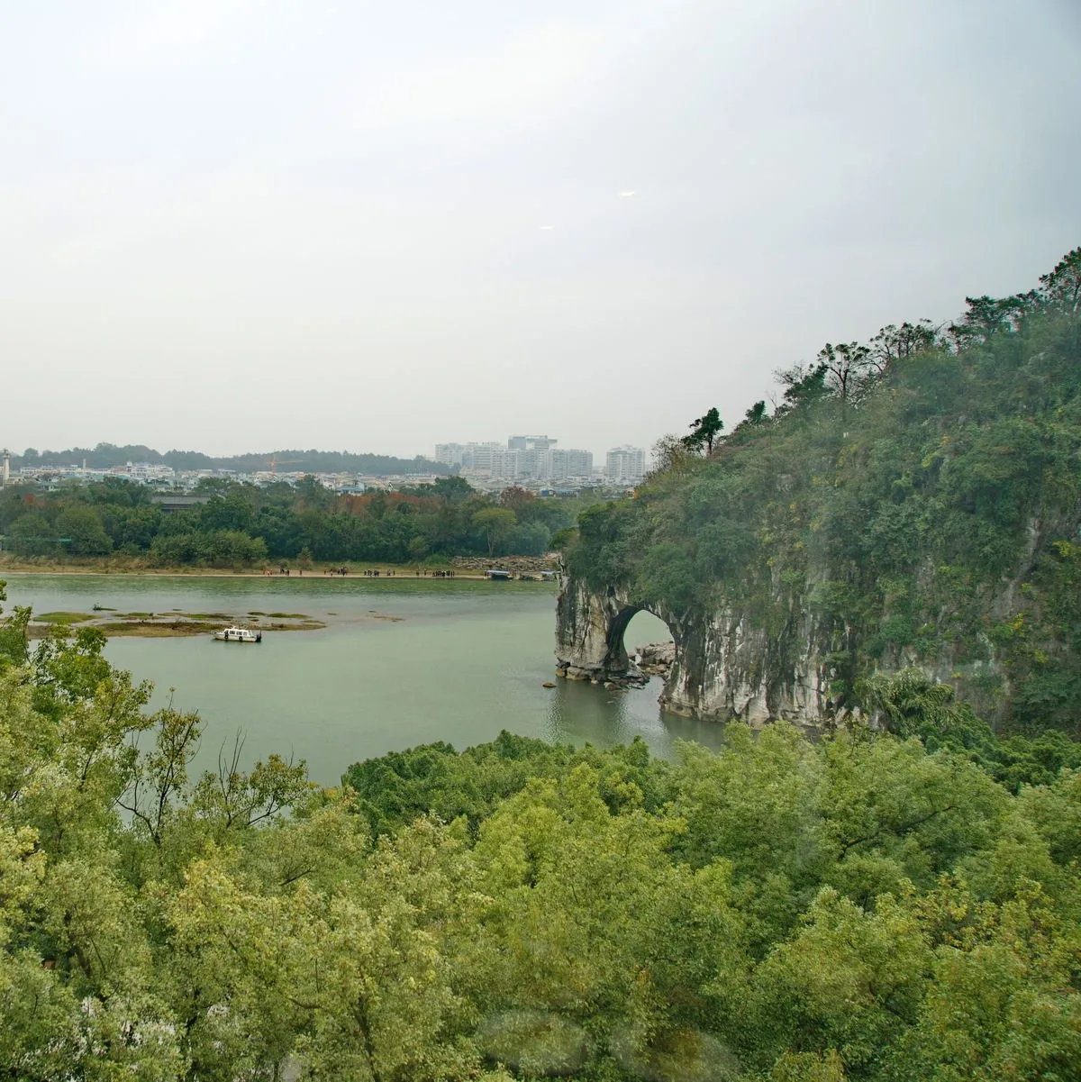 Elephant Trunk Hill and its Water Moon arch beside the Li River in Guilin