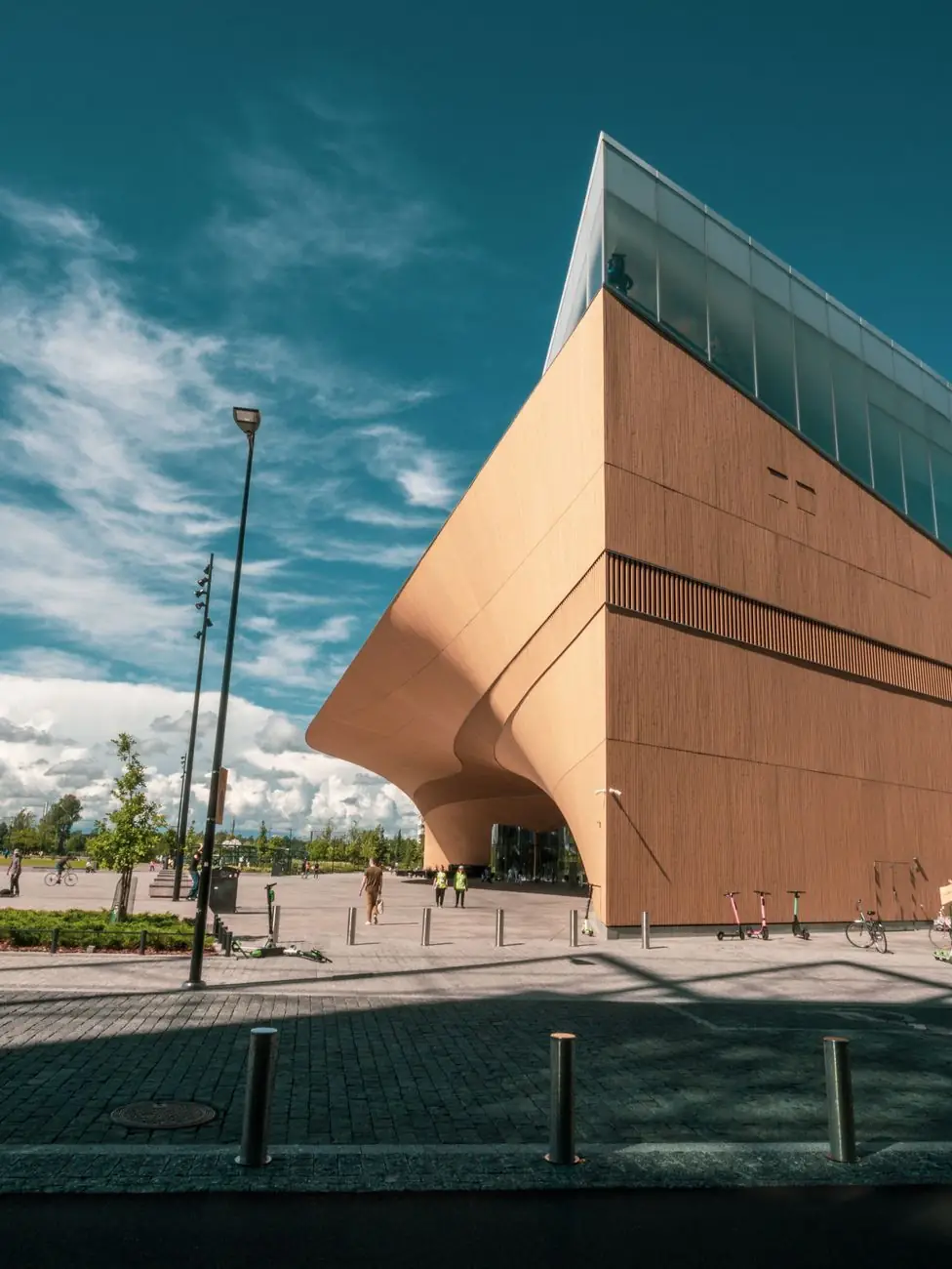 Oodi’s curved timber exterior beside Helsinki’s civic square