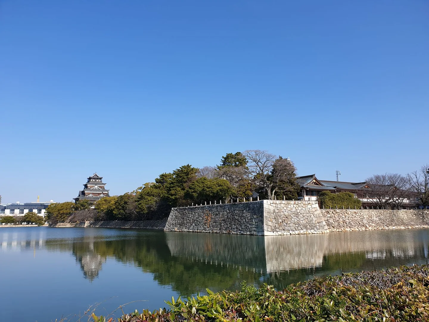 Hiroshima Castle’s keep and reconstructed Ninomaru walls beyond the moat