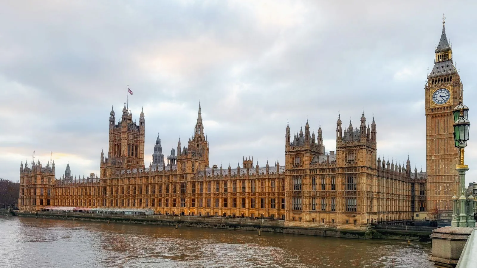 The Palace of Westminster and Elizabeth Tower beside the Thames in London