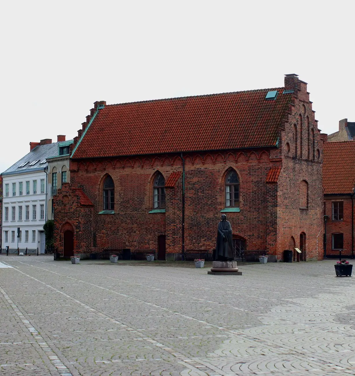 Liberiet’s medieval red-brick facade beside Lund Cathedral