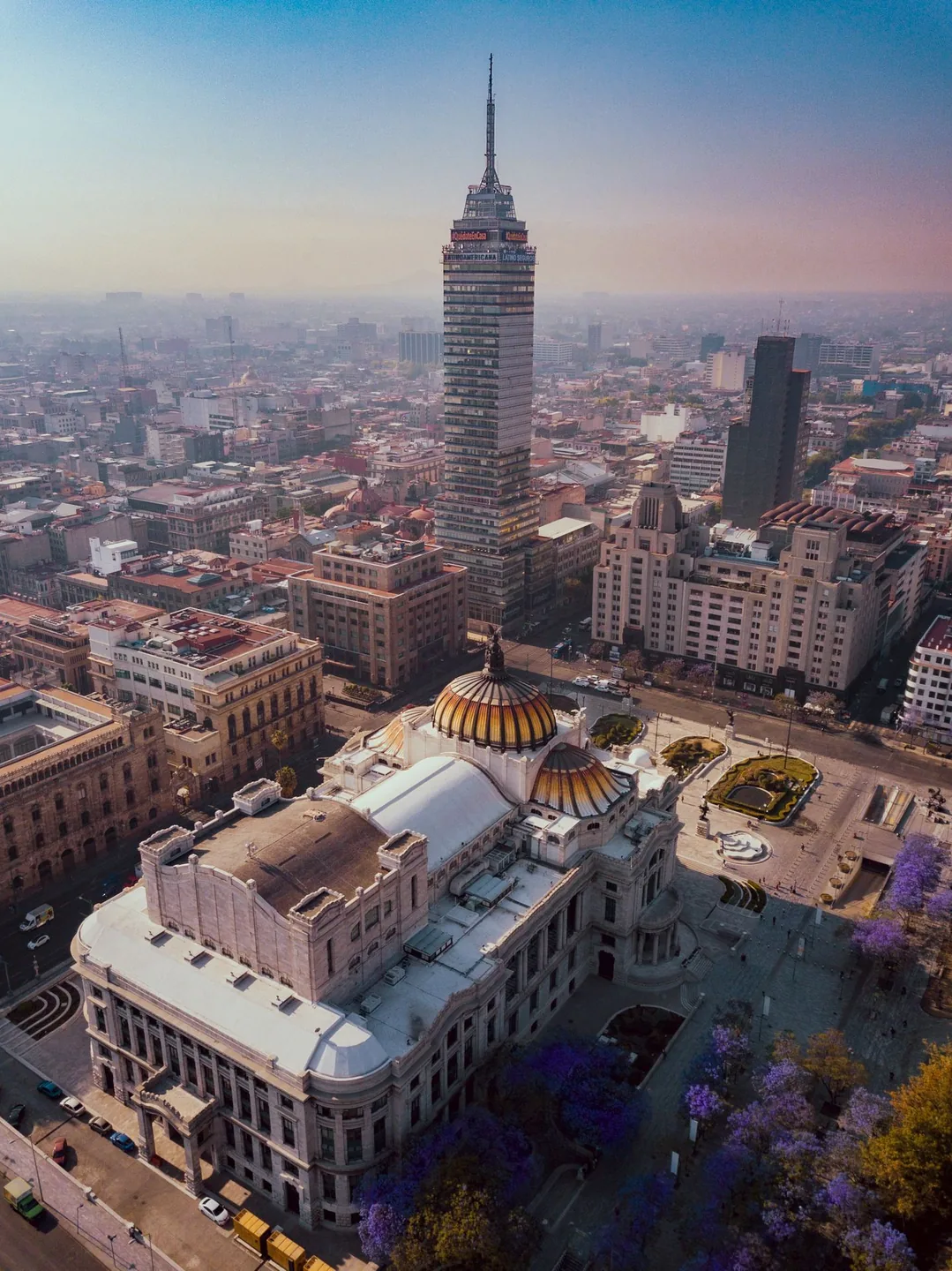 Palacio de Bellas Artes with its coloured dome and Torre Latinoamericana behind in Mexico City