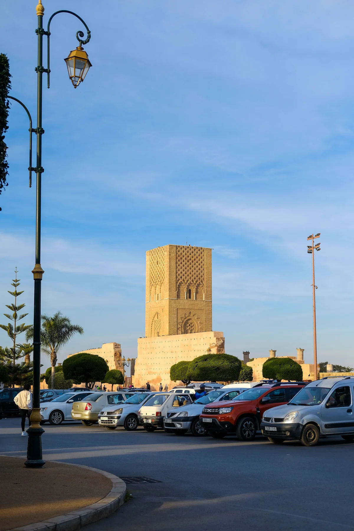 Hassan Tower rising above the walls and trees beside Rabat’s unfinished mosque