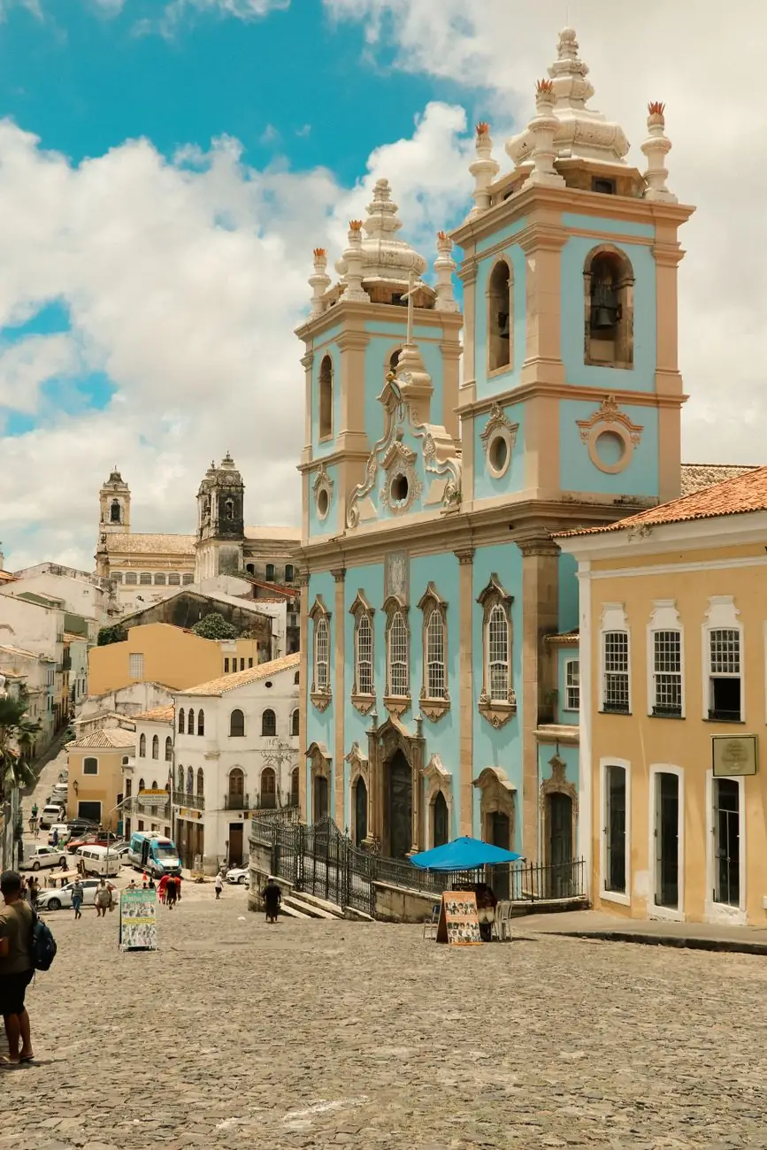 Blue twin towers of Nossa Senhora do Rosário dos Pretos overlooking Largo do Pelourinho