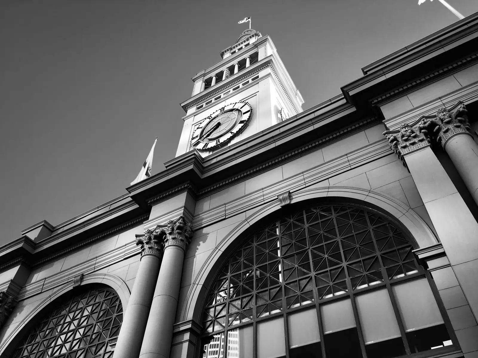 The San Francisco Ferry Building clock tower above its arched entrance
