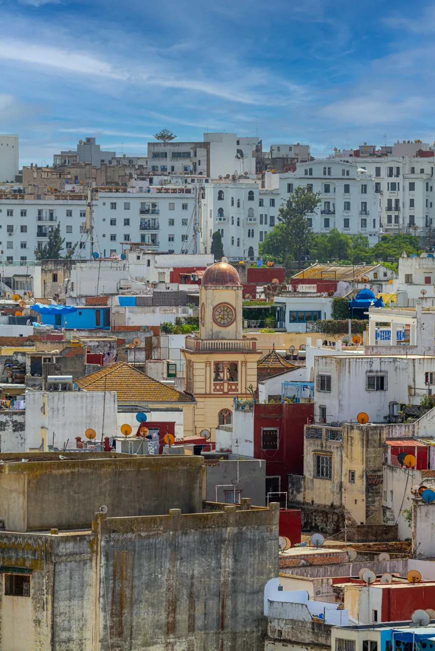 La Purísima church clock tower and cupola among the rooftops of Tangier medina