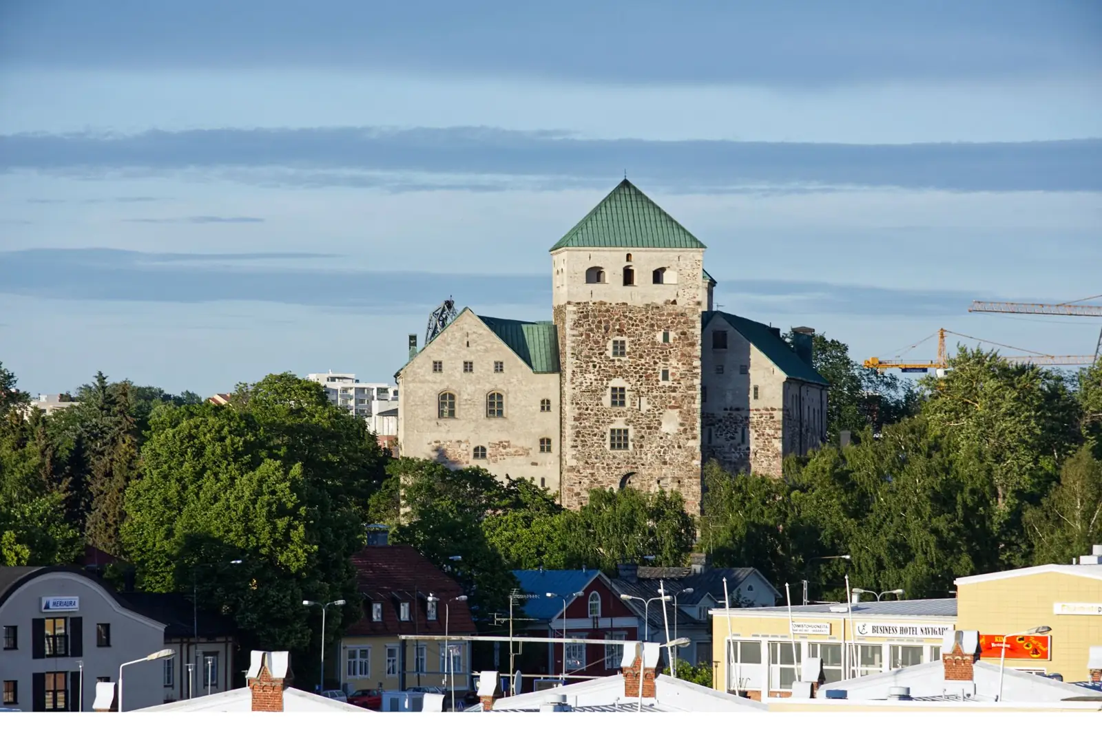 Turku Castle and its massive stone towers above the surrounding district