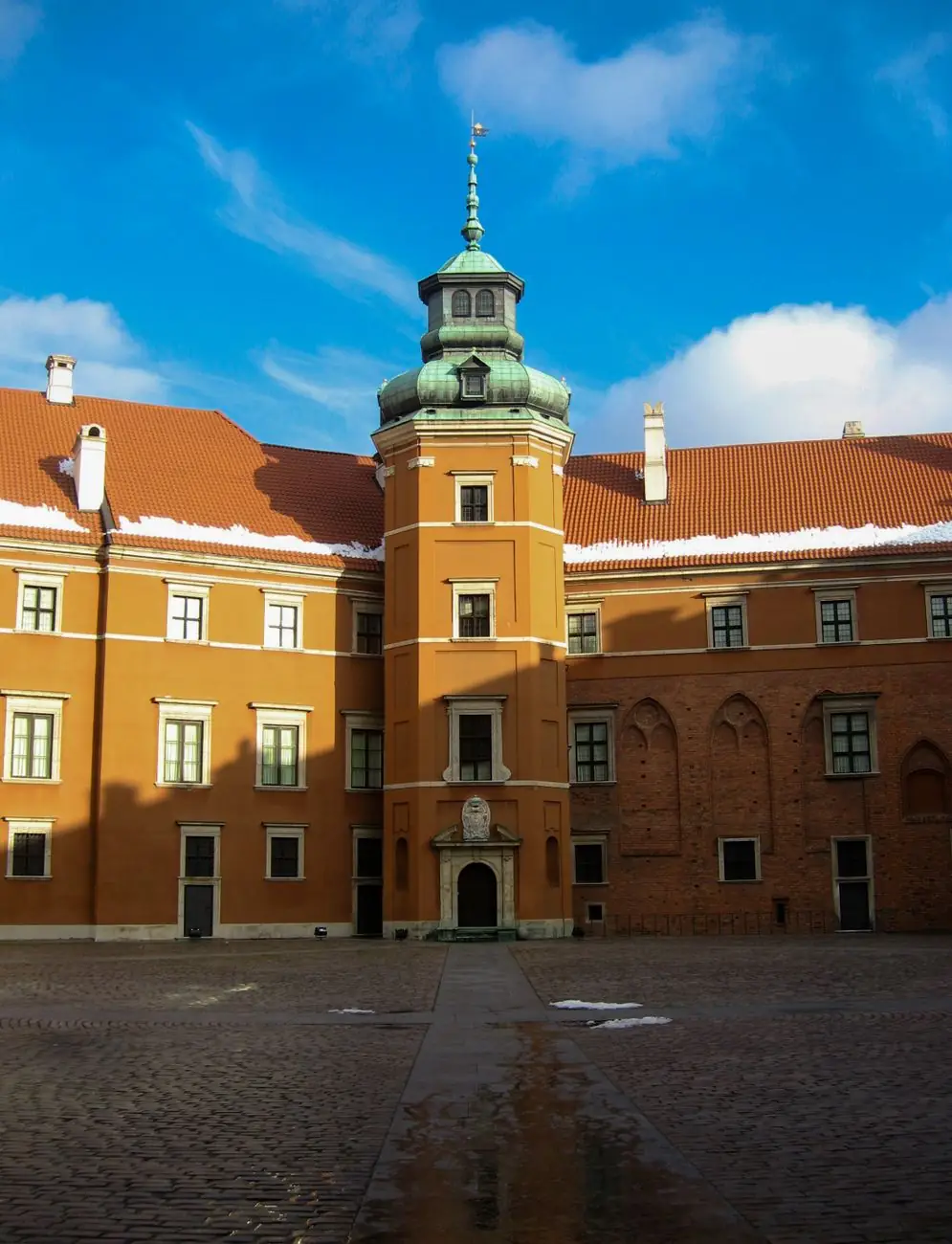 A tower and reconstructed façades in the Royal Castle courtyard in Warsaw