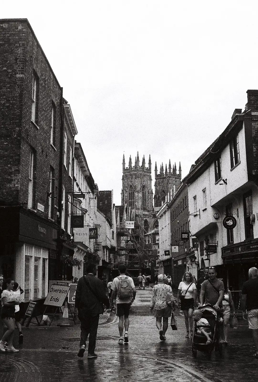 A black and white view of York streets leading towards the Minster