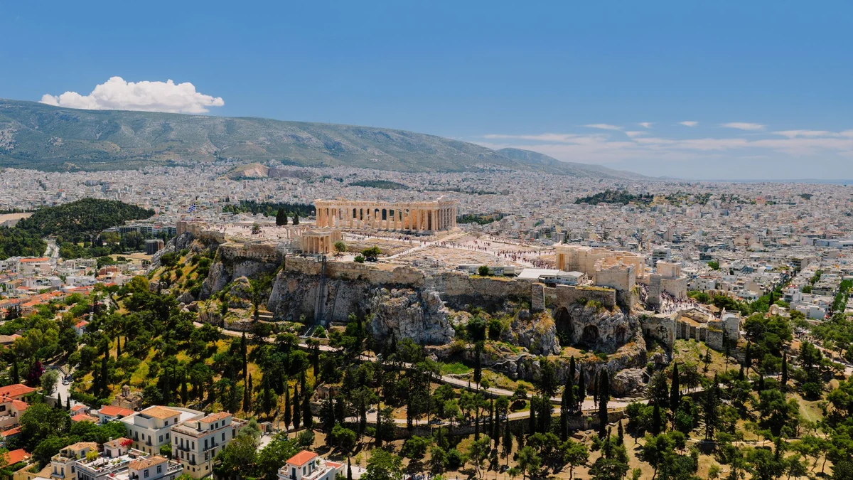 The Parthenon and Acropolis rock above the Athens cityscape