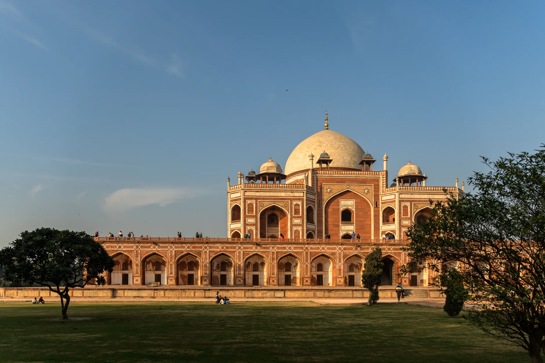 Humayun’s Tomb with its white dome, red sandstone arches and garden lawn in Delhi