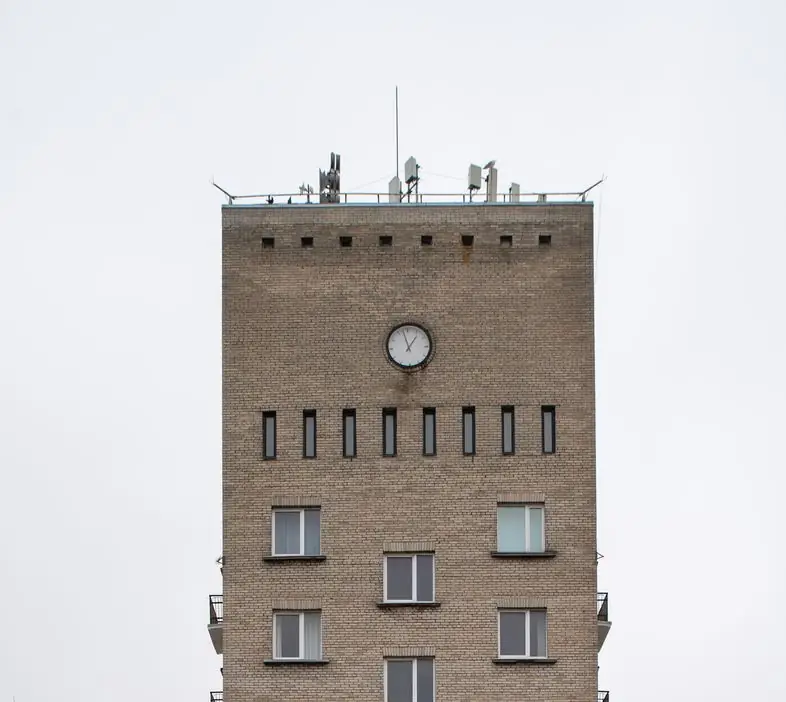 The clock and upper brick façade of Haapsalu’s Posti Street water tower
