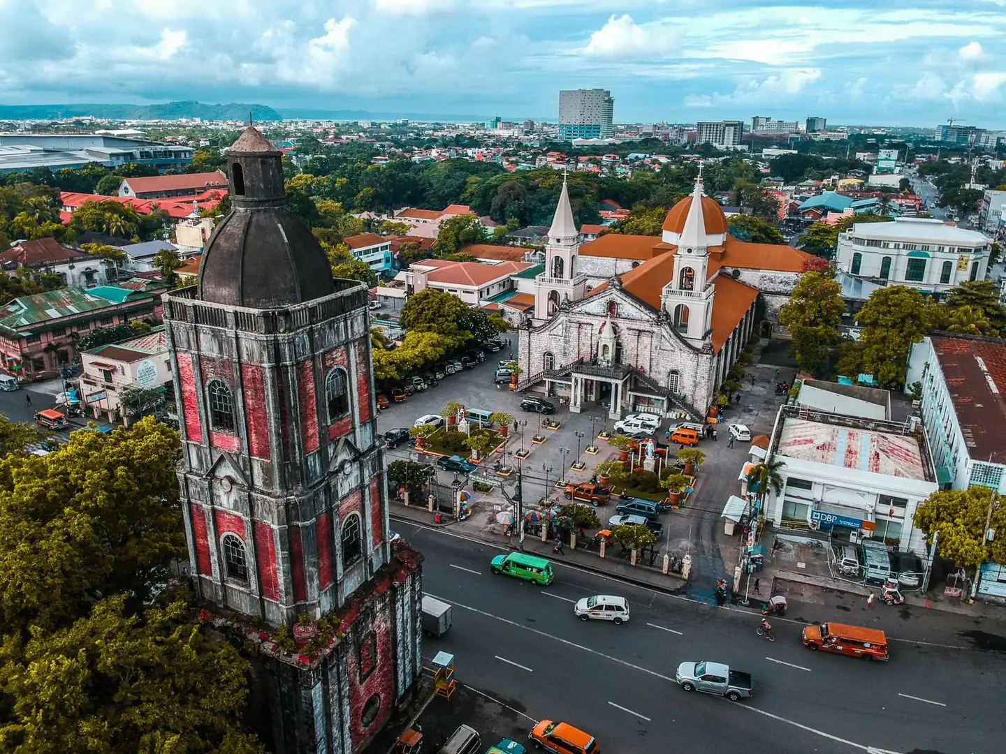 Aerial view of Jaro Cathedral and its separate belfry beside Jaro Plaza in Iloilo City