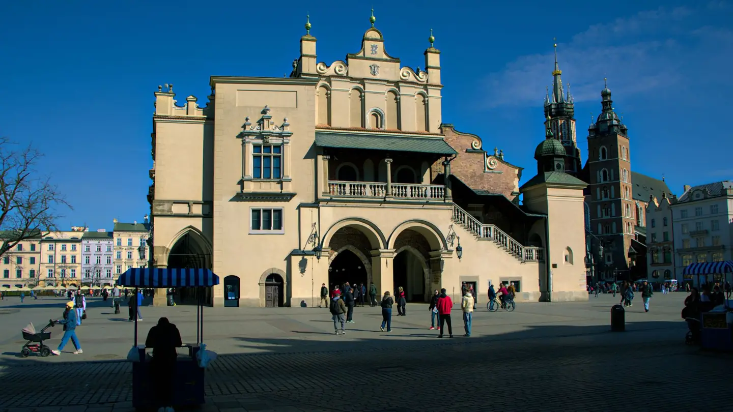 The Cloth Hall on Kraków’s Main Market Square with St Mary’s Basilica towers behind it