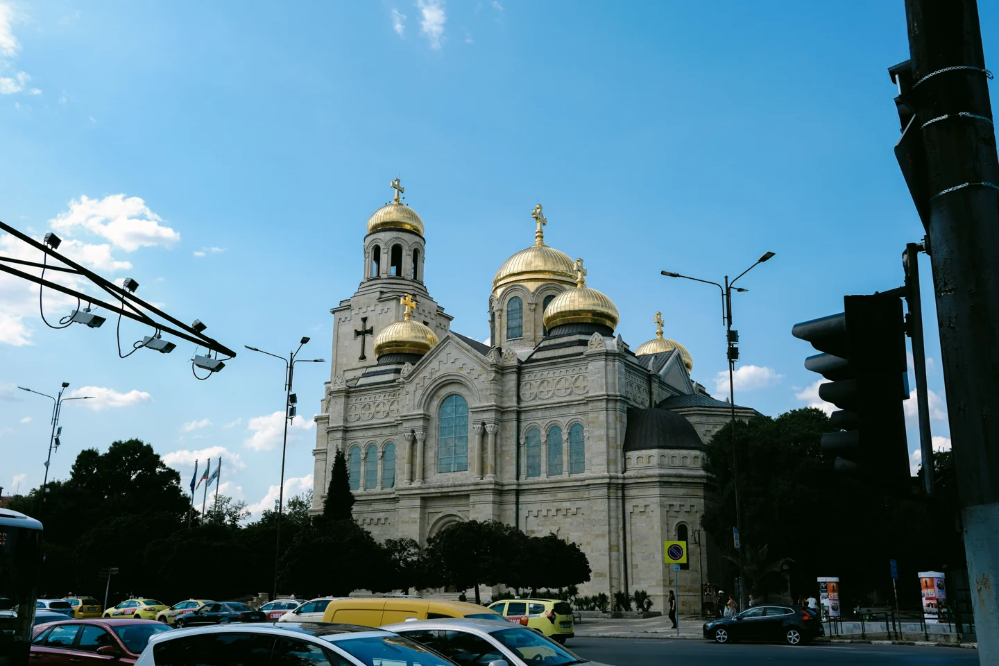 Varna’s Assumption Cathedral with gilded domes beside a central street